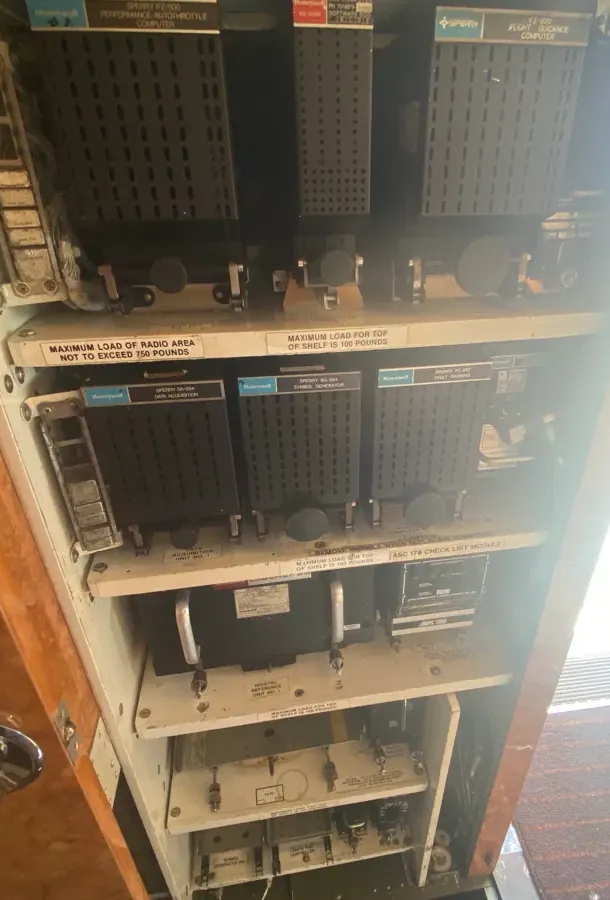 Avionics rack with flight computers on its shelves